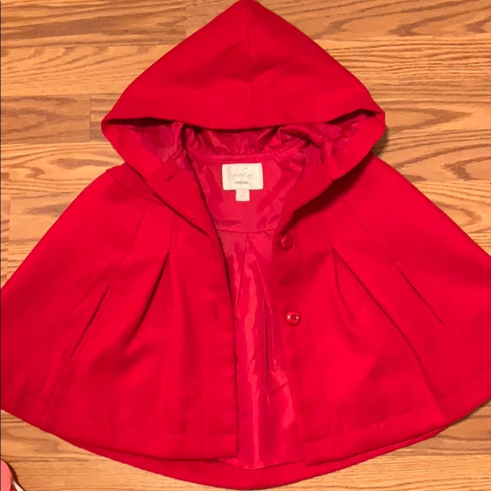 Toddler red cape coat.